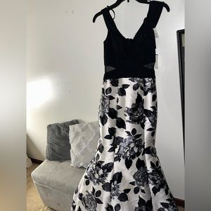 Long black and white never worn before Camille La Vie prom dress in the size 4.